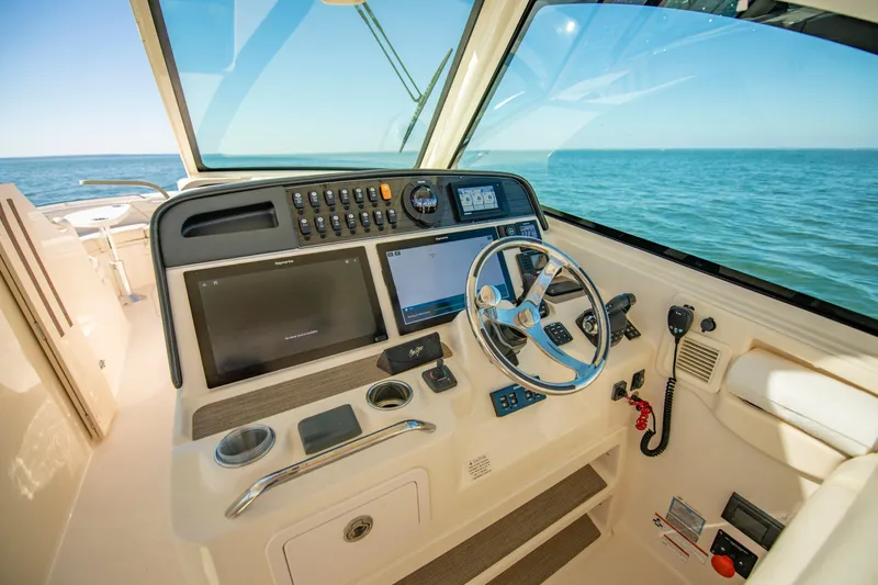  Yacht Photos Pics 2019 Grady-White Freedom 375 helm with modern controls and ocean view.