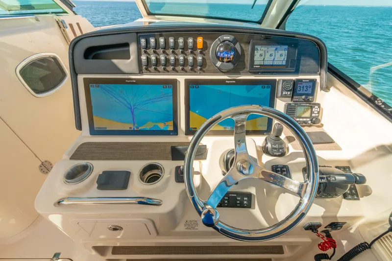  Yacht Photos Pics 2019 Grady-White Freedom 375 helm with dual navigation screens and steering wheel.