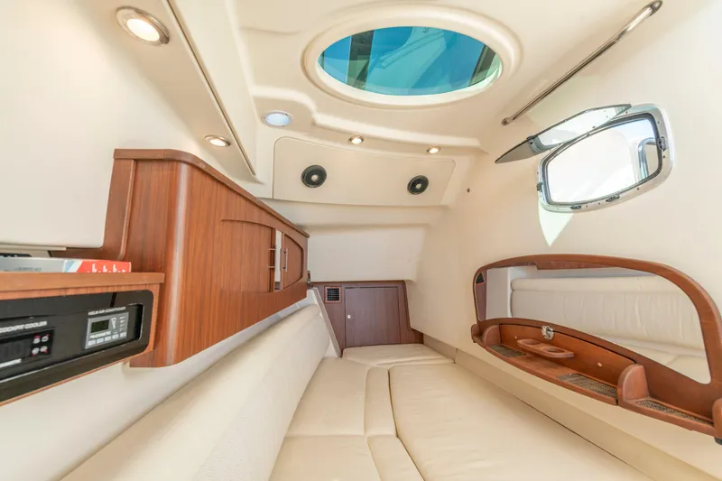  Yacht Photos Pics Luxurious interior of 2019 Grady-White Freedom 375 boat with elegant wood finishes.