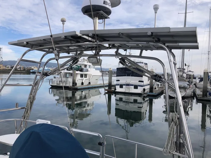 Papa Bob Yacht Photos Pics 1996 Catalina 42 MkII sailboat docked in a marina with solar panels.