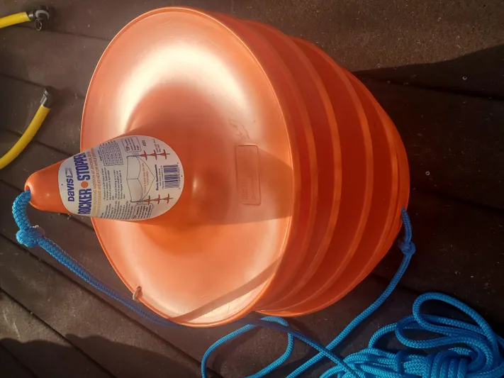 Papa Bob Yacht Photos Pics Orange collapsible funnel with blue rope, suitable for Catalina 42 MkII, 1996 model.