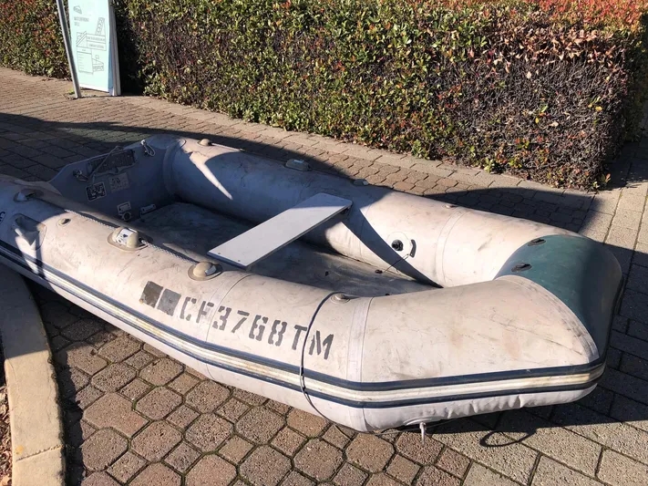 Papa Bob Yacht Photos Pics Inflatable dinghy on pavement, associated with 1996 Catalina 42 MkII.