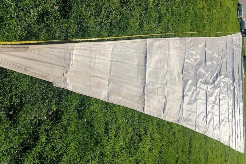 Papa Bob Yacht Photos Pics Sail from a 1996 Catalina 42 MkII laid out on grass.