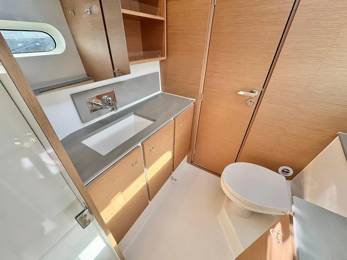 Sea SeÑora Yacht Photos Pics Modern bathroom in 2023 Excess 12 yacht with sleek fixtures and wooden cabinetry.
