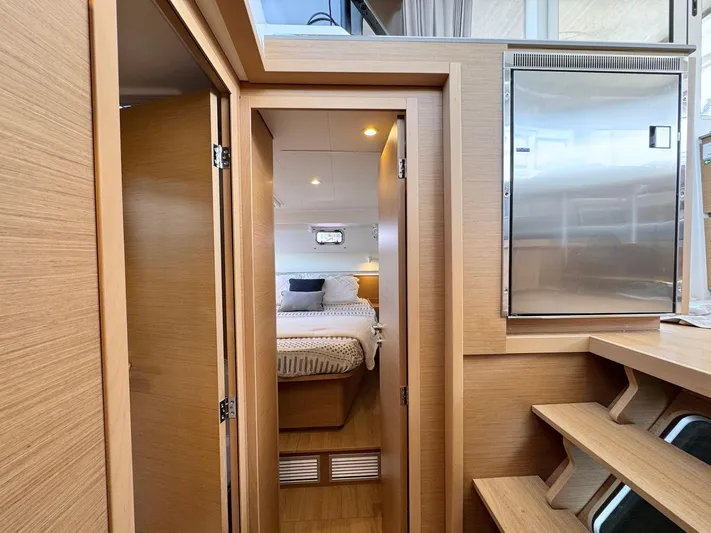 Sea SeÑora Yacht Photos Pics Modern interior of 2023 Excess 12 yacht with cozy bedroom and wooden finishes.