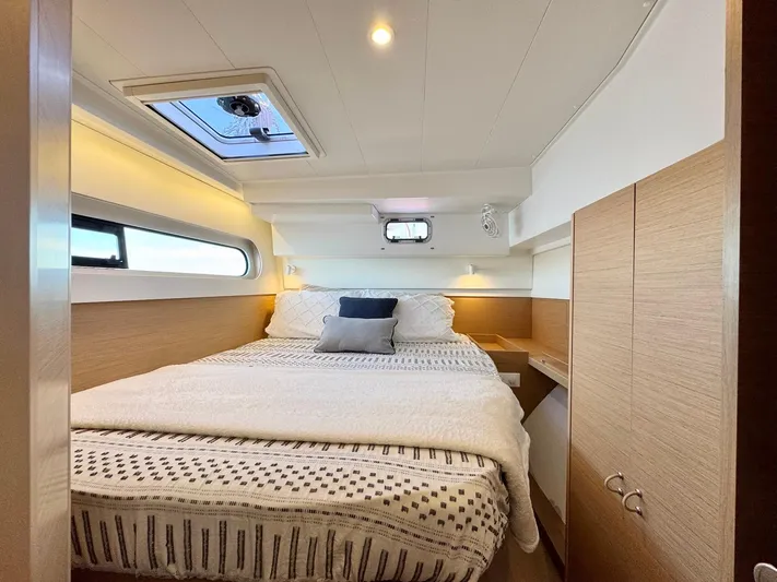 Sea SeÑora Yacht Photos Pics Luxurious cabin interior of 2023 Excess 12 yacht with cozy bed and modern design.