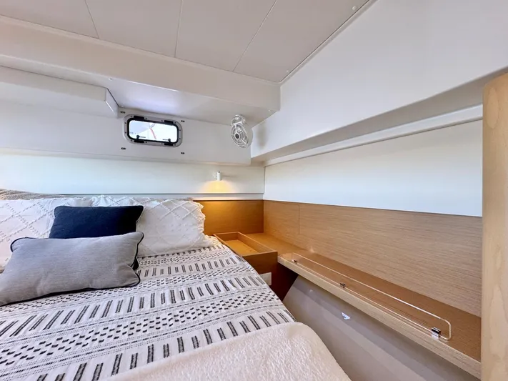 Sea SeÑora Yacht Photos Pics Cozy cabin interior of 2023 Excess 12 yacht with stylish bedding and ambient lighting.