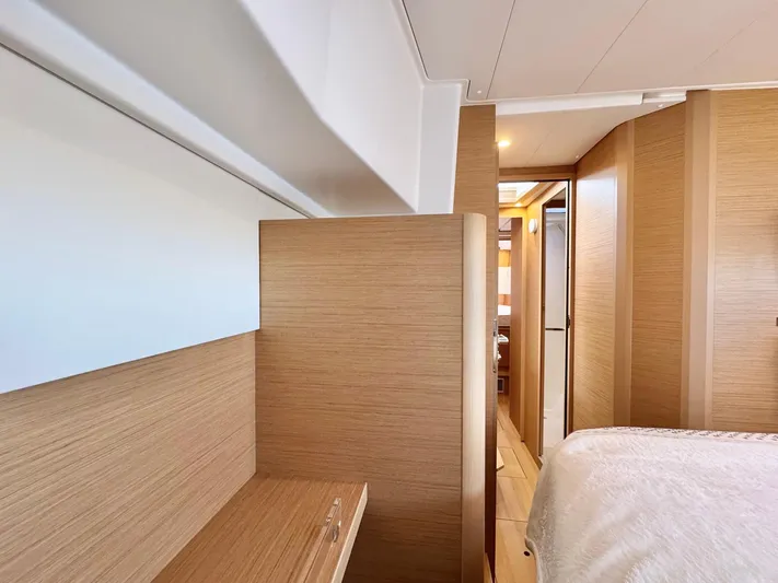 Sea SeÑora Yacht Photos Pics Interior of 2023 Excess 12 yacht, featuring modern wood paneling and cozy cabin space.