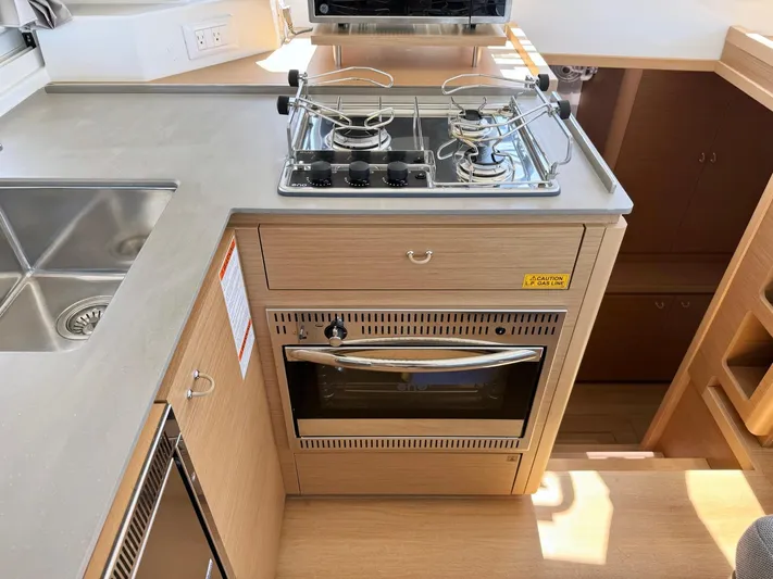 Sea SeÑora Yacht Photos Pics Modern kitchen in 2023 Excess 12 yacht with stove, oven, and sink.