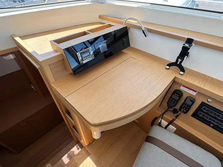Sea SeÑora Yacht Photos Pics Modern navigation station in 2023 Excess 12 yacht with sleek wood finish and advanced controls.