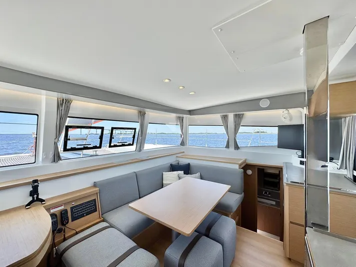 Sea SeÑora Yacht Photos Pics Luxurious interior of 2023 Excess 12 catamaran with ocean view and modern furnishings.