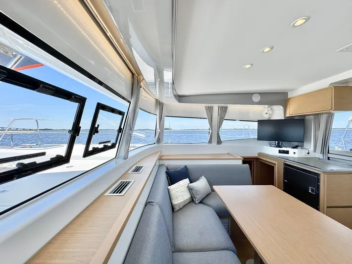 Sea SeÑora Yacht Photos Pics Luxurious interior of 2023 Excess 12 yacht with panoramic windows and modern furnishings.