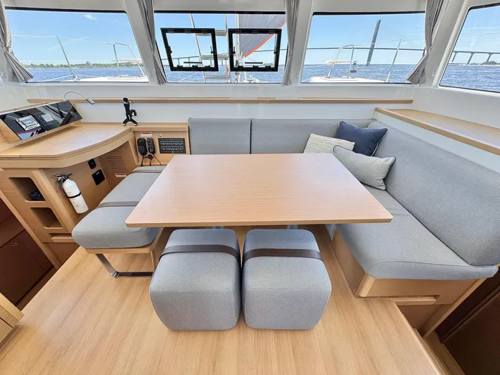 Sea SeÑora Yacht Photos Pics Modern interior of 2023 Excess 12 catamaran with dining area and panoramic windows.