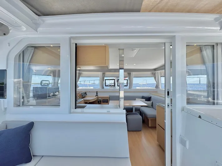 Sea SeÑora Yacht Photos Pics Modern interior of 2023 Excess 12 catamaran with spacious seating and panoramic windows.