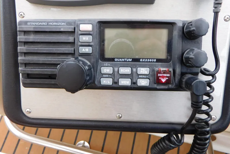 Just One More Yacht Photos Pics VHF radio on 2005 Cruisers Yachts 520 Express, featuring distress button and control knobs.