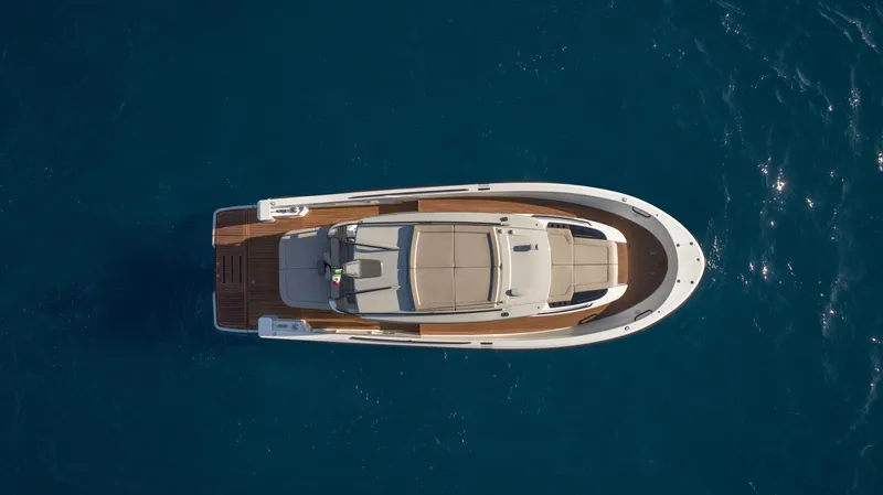 Bg42-49 Yacht Photos Pics 2023 Bluegame BG42 yacht, aerial view, cruising on deep blue water.