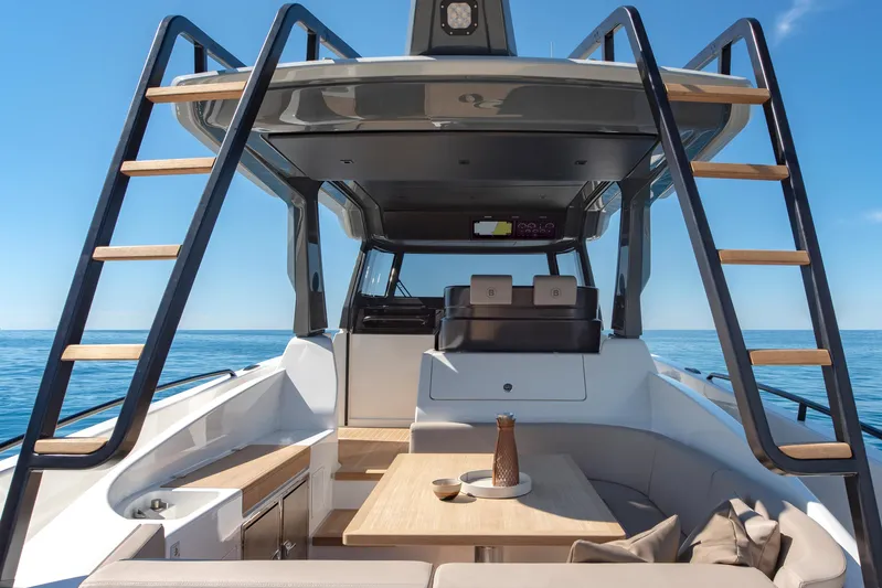 Bg42-49 Yacht Photos Pics 2023 Bluegame BG42 yacht interior with modern seating and ocean view.