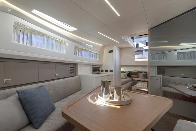 Bg42-49 Yacht Photos Pics Luxurious interior of 2023 Bluegame BG42 yacht, featuring modern seating and elegant design.