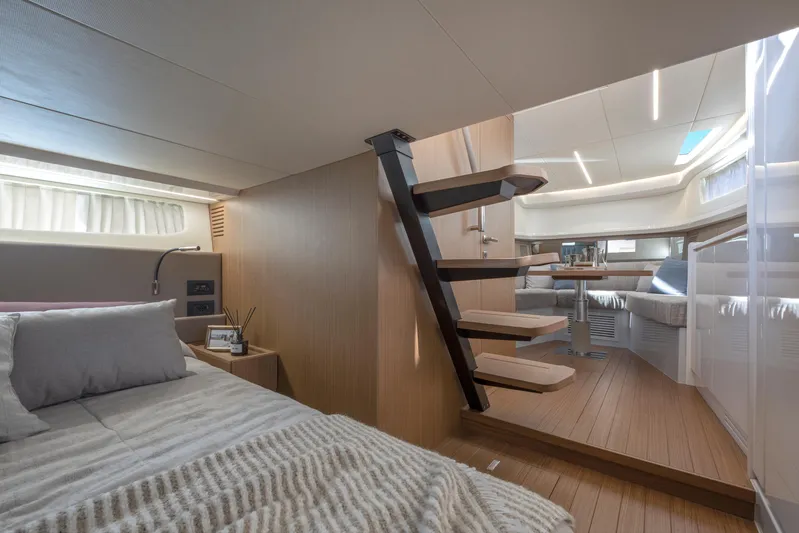 Bg42-49 Yacht Photos Pics Luxurious interior of 2023 Bluegame BG42 yacht with modern design and wooden accents.