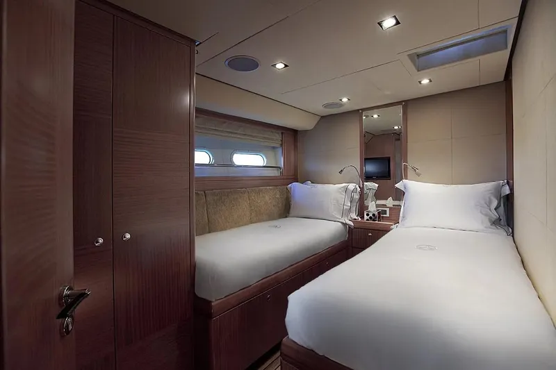 Aiyana Yacht Photos Pics Luxurious twin cabin interior on 2010 Alia Yachts AIYANA, featuring elegant wood finishes.