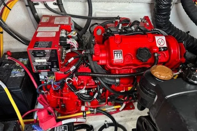  Yacht Photos Pics Engine compartment of a 2021 Monterey 335 Sport Yacht with red EFI system.