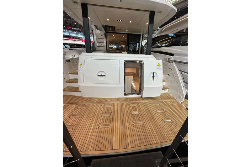  Yacht Photos Pics 2024 Azimut Fly 68 yacht with teak deck and modern design.