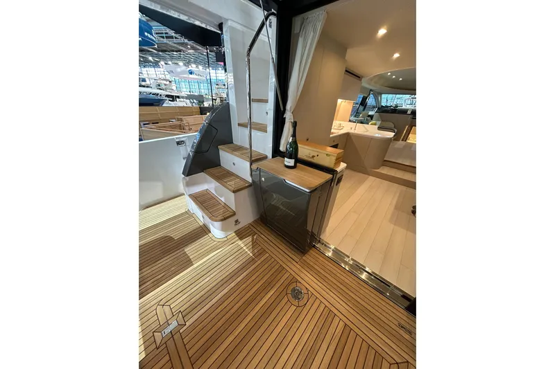  Yacht Photos Pics Luxurious interior of 2024 Azimut Fly 68 yacht with elegant wood flooring and modern design.