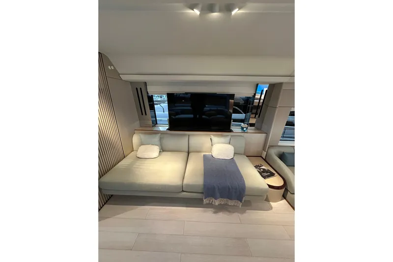  Yacht Photos Pics Luxurious interior of 2024 Azimut Fly 68 yacht with elegant seating and modern decor.