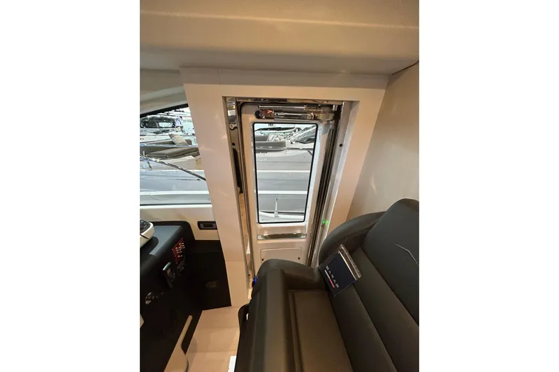  Yacht Photos Pics Interior view of 2024 Azimut Fly 68 yacht, featuring sleek design and modern seating.