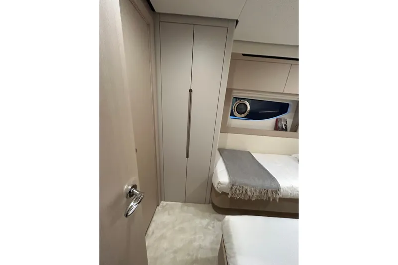  Yacht Photos Pics 2024 Azimut Fly 68 yacht interior with modern bedroom design and sleek furnishings.