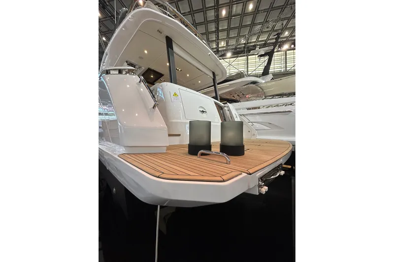  Yacht Photos Pics 2024 Azimut Fly 68 yacht with elegant wooden deck and modern design.