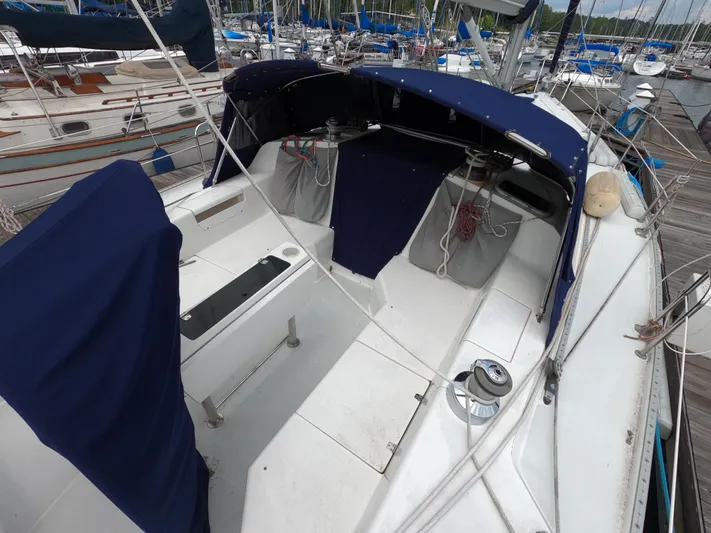 Brisa Surena Yacht Photos Pics 2002 Catalina 42 MK11 sailboat with blue covers docked at marina.