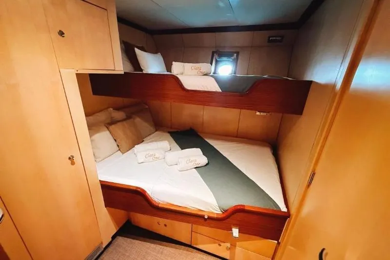 Clara One Yacht Photos Pics Cozy cabin with bunk beds in a 1961 Custom model 90 yacht.
