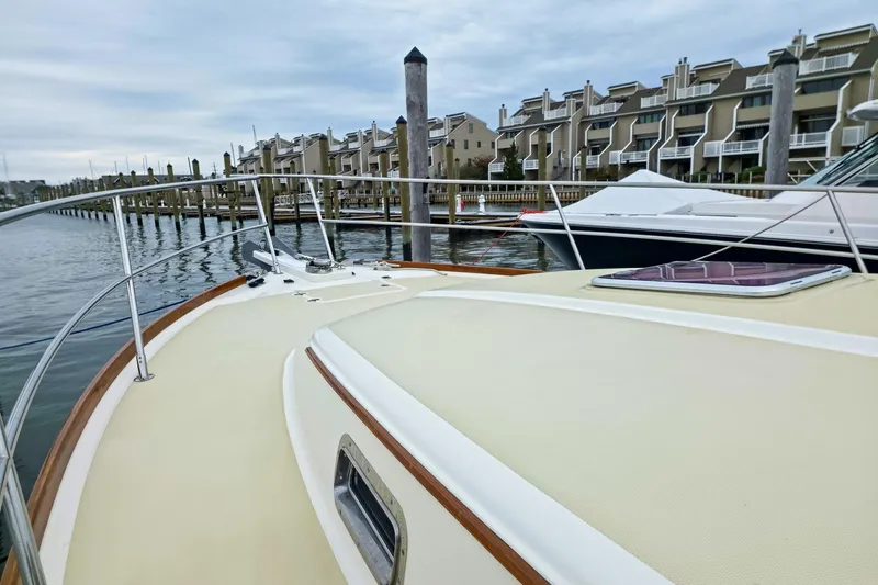  Yacht Photos Pics 2008 Sabre 34 Express yacht docked near waterfront homes.