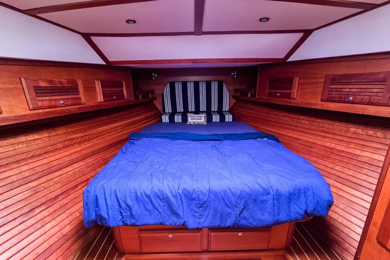  Yacht Photos Pics Luxurious wooden cabin interior of 2008 Sabre 34 Express yacht with cozy bed.