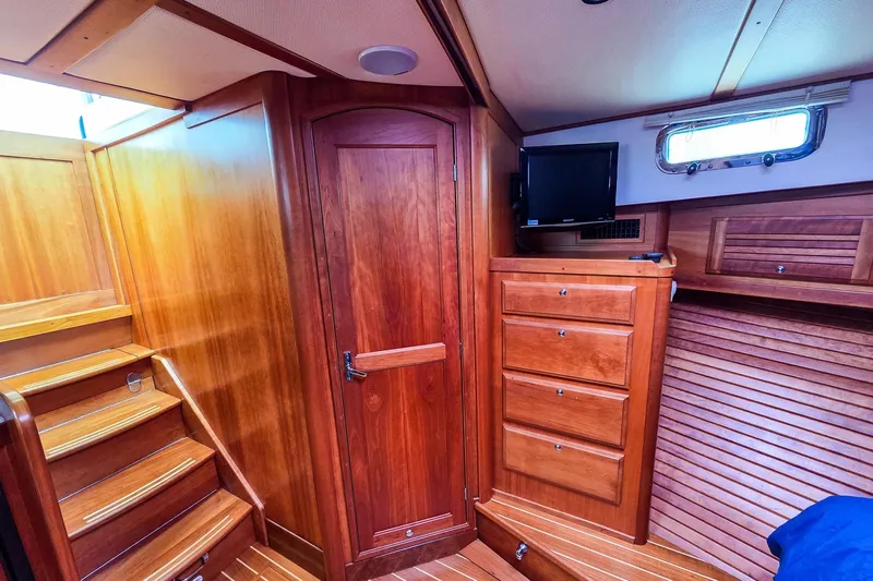 Yacht Photos Pics Interior of 2008 Sabre 34 Express yacht with wooden cabinetry and stairs.