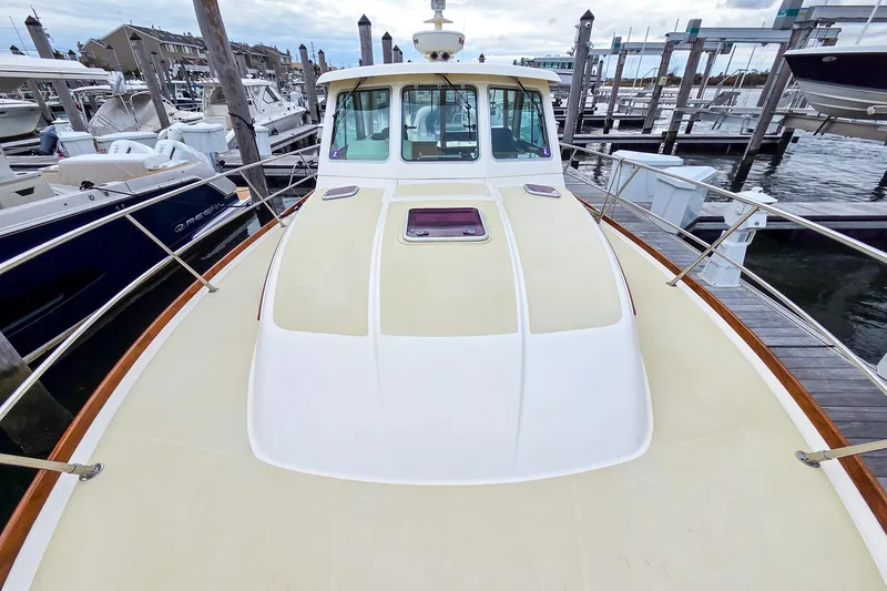  Yacht Photos Pics 2008 Sabre 34 Express boat docked at marina, showcasing deck and cabin.