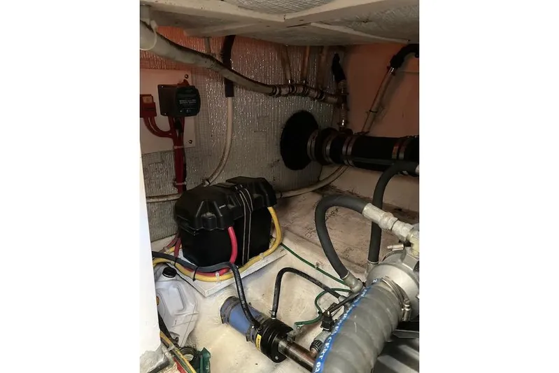  Yacht Photos Pics 2008 Sabre 34 Express engine compartment with wiring and mechanical components.