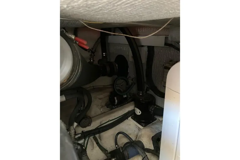  Yacht Photos Pics Engine compartment of a 2008 Sabre 34 Express boat, showing mechanical components and wiring.