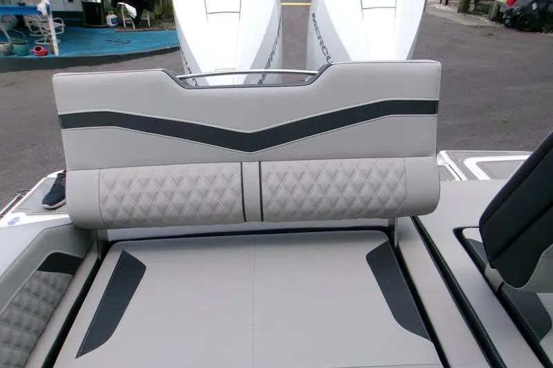  Yacht Photos Pics 2026 Monterey Elite 30 OB boat interior with stylish seating and dual outboard engines.