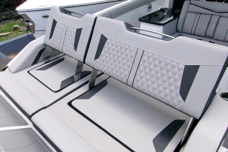  Yacht Photos Pics Luxurious seating on 2026 Monterey Elite 30 OB boat with modern design and premium materials.