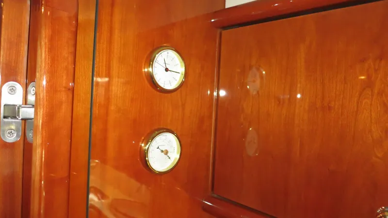 1299 Yacht Photos Pics Polished wooden interior with gauges on a 1996 Sunseeker Predator 63 yacht.