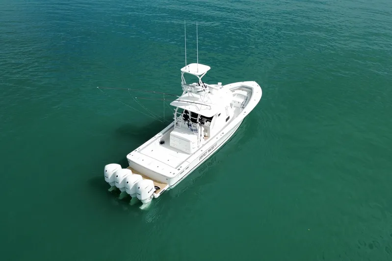  Yacht Photos Pics 2018 Regulator 41 boat with four engines on calm water.