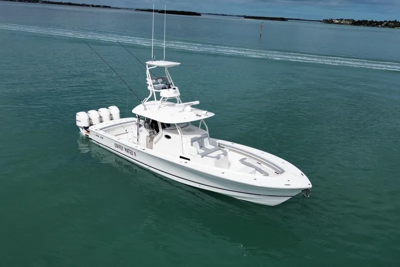  Yacht Photos Pics 2018 Regulator 41 boat on calm water, featuring multiple outboard engines.