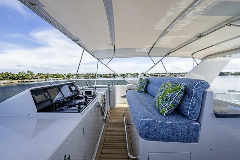 Probability Yacht Photos Pics Luxurious 1997 Delta 122 Tri-Deck Motor Yacht with spacious deck and plush seating.