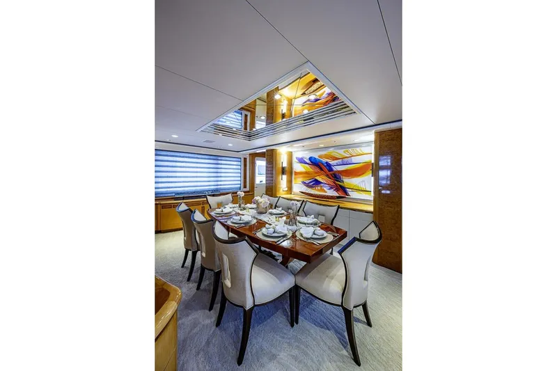 Probability Yacht Photos Pics Luxurious dining area on 1997 Delta 122 Tri-Deck Motor Yacht with elegant decor.