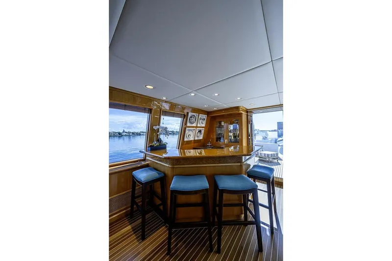 Probability Yacht Photos Pics Luxurious bar area on 1997 Delta 122 Tri-Deck Motor Yacht with ocean view.
