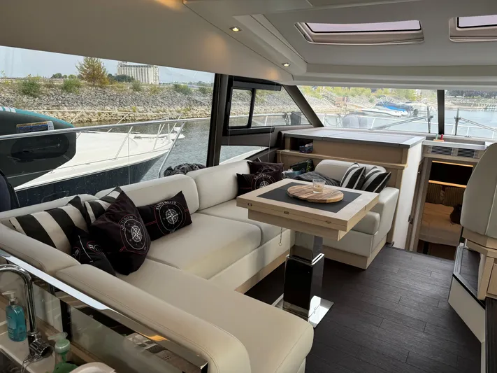  Yacht Photos Pics Luxurious interior of 2023 Prestige 520S yacht with elegant seating and modern design.
