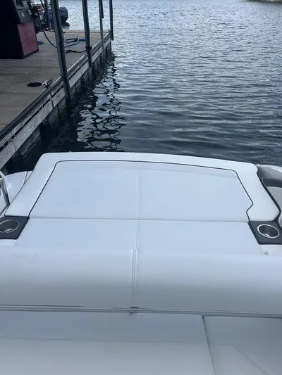  Yacht Photos Pics 2025 Formula 290 Bowrider docked by the water.