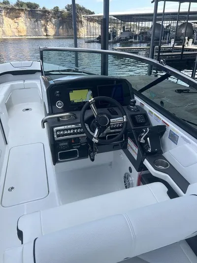  Yacht Photos Pics 2025 Formula 290 Bowrider boat interior with modern dashboard and steering wheel.